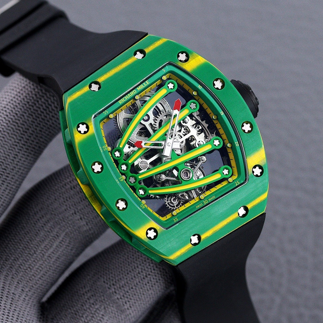 Richard Mille skeleton watch with green case, yellow trim, exposed gears, black strap view