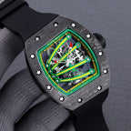 Skeleton watch with green dial and black rubber strap, black textured case with star screws