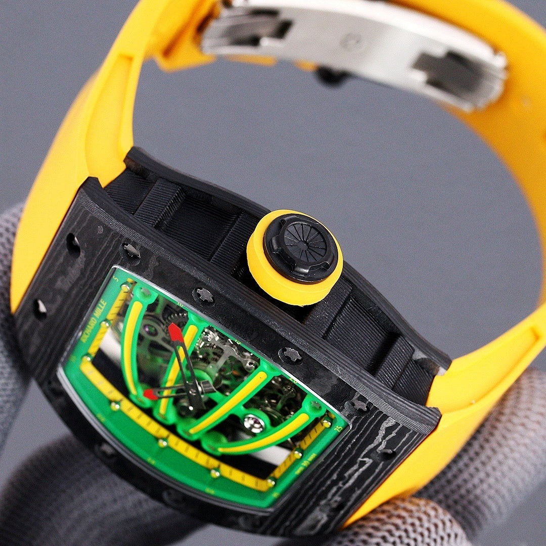 Skeleton watch case with green dial, yellow rubber strap, side button and black strap ridges