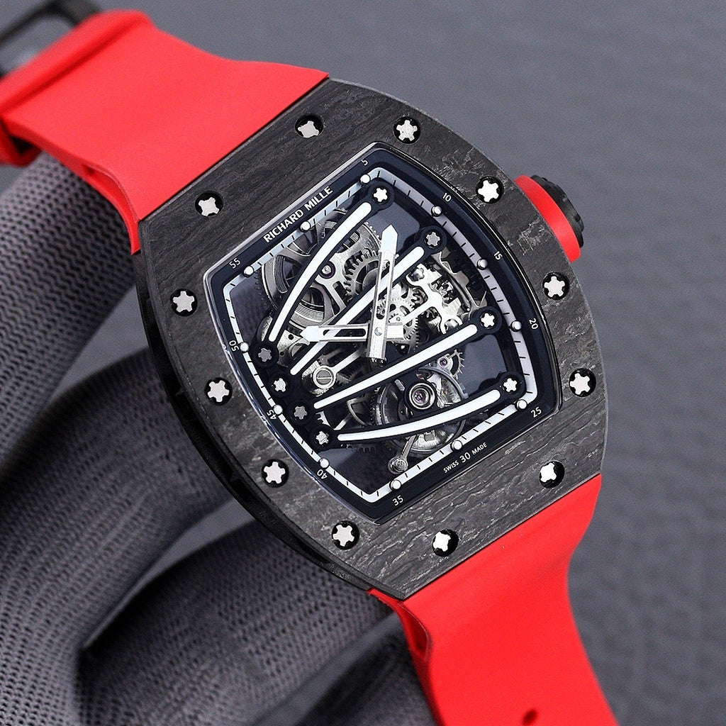 Richard Mille watch with skeleton dial, dark case, red rubber strap and red accents