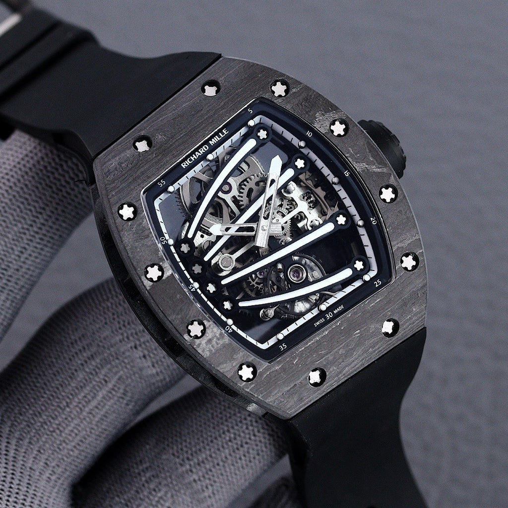 Richard Mille watch angled view, skeleton dial, dark bezel, black rubber strap