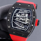 Richard Mille watch front view, skeleton dial, dark case, red rubber strap