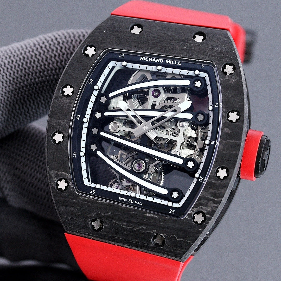 Richard Mille watch front view, skeleton dial, dark case, red rubber strap