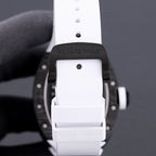 Richard Mille watch back view, white strap with buckle and clasp, dark case