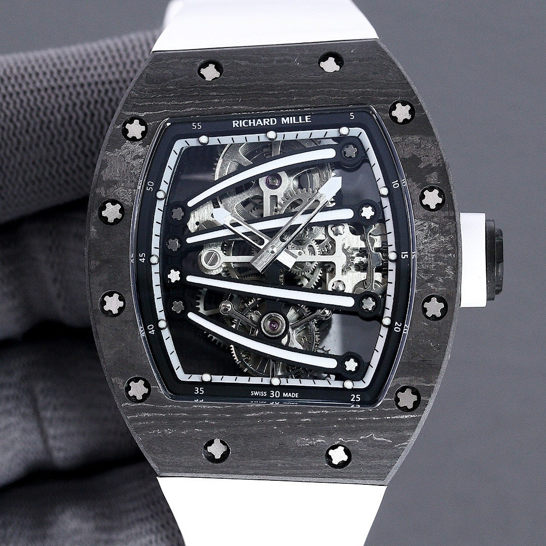 Richard Mille watch front view, skeleton dial and dark bezel, white rubber strap