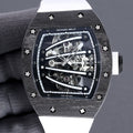 Richard Mille watch with skeleton dial, dark bezel, white rubber strap, crown on right
