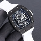 Richard Mille watch angled view, skeleton dial with exposed gears, dark case, white strap