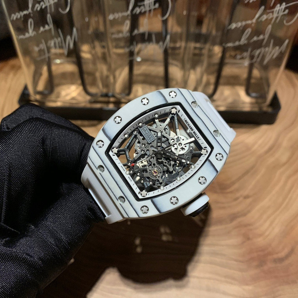 Luxury wristwatch showing skeleton movement through a clear dial window