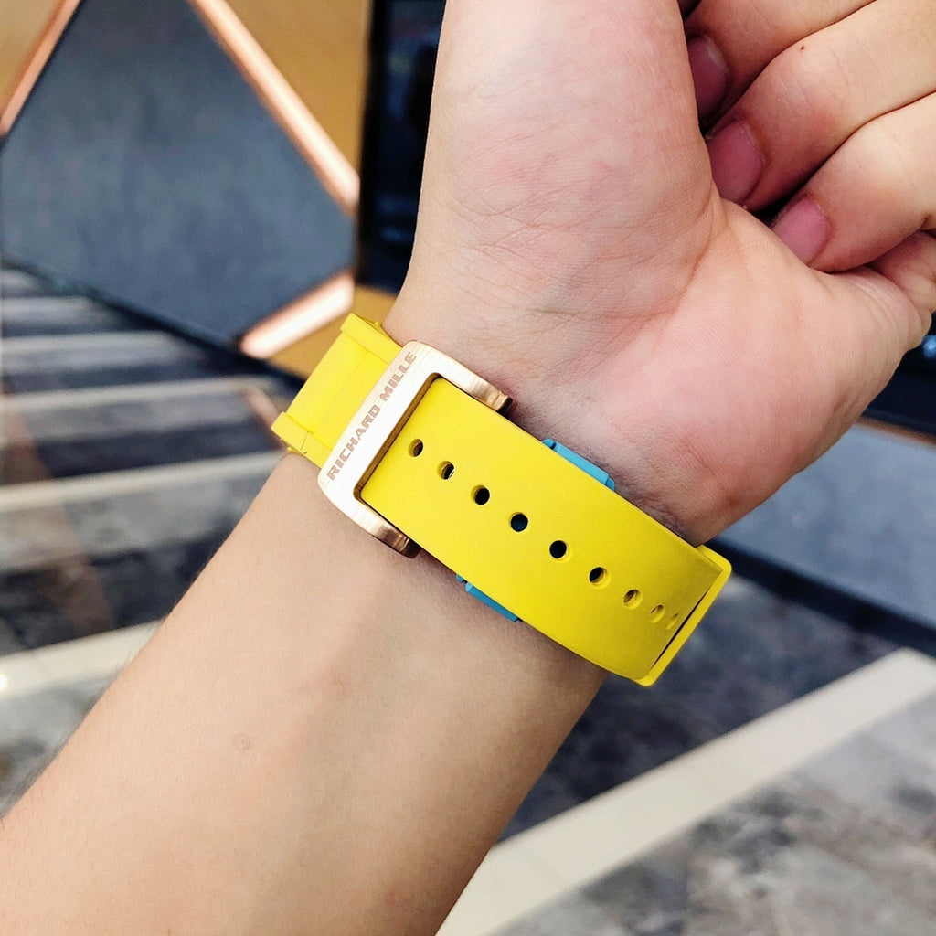 Richard Mille watch strap view with yellow silicone band and pin buckle