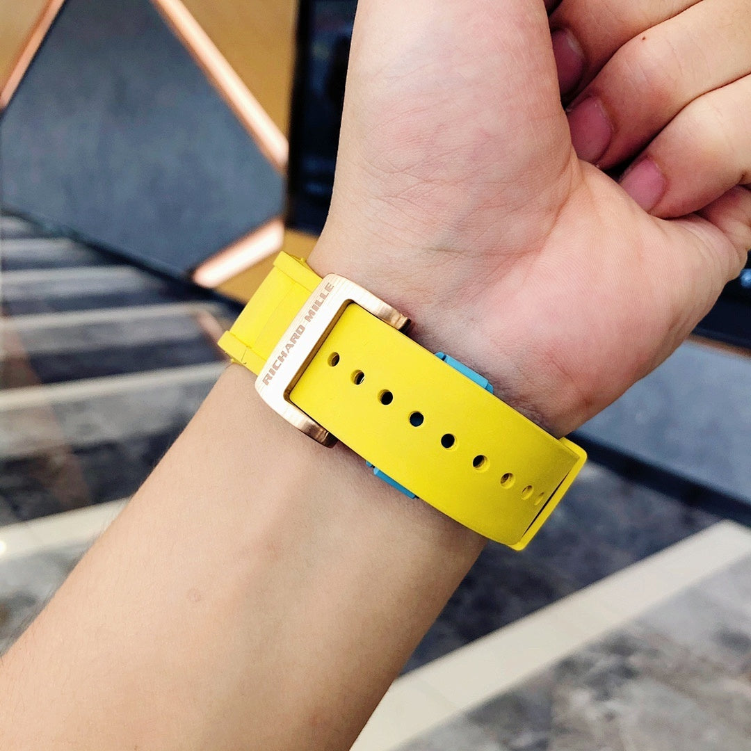 Richard Mille watch strap view with yellow silicone band and pin buckle