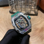 Luxury wristwatch with green strap, silver bezel, and colorful jeweled open dial