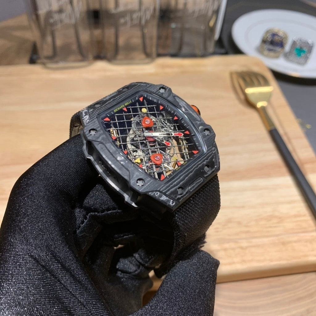 Richard Mille watch side profile with black strap and square skeleton case
