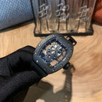 Richard Mille watch, side-front view showing silver case details and skeleton dial