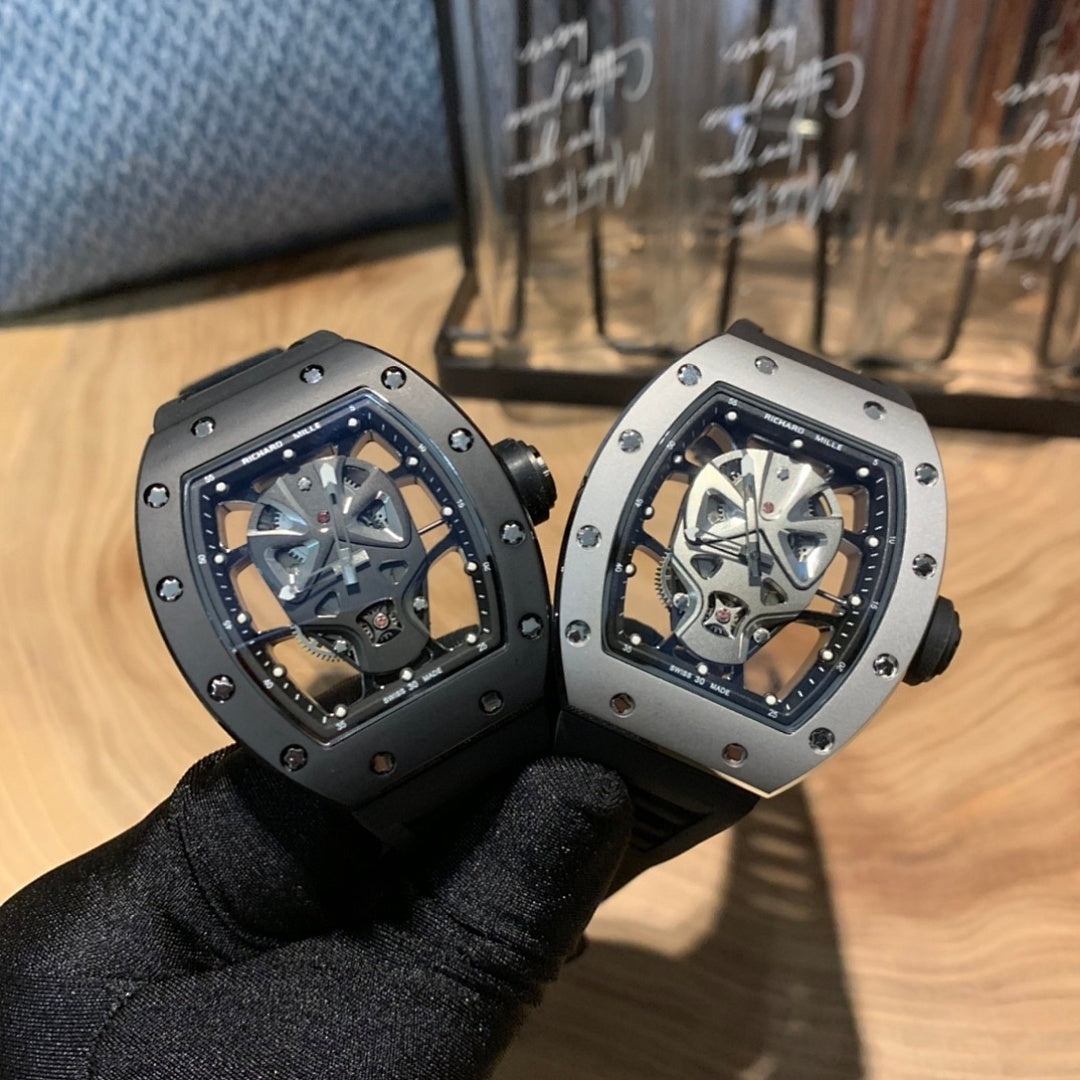 Richard Mille watches, two angles shown with silver cases and black straps