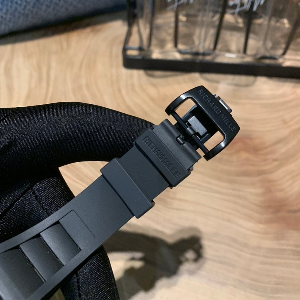 Richard Mille watch, black strap with deployment clasp and engraved buckle