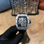 Richard Mille watch, centered front view with silver case, black bezel, skeleton dial