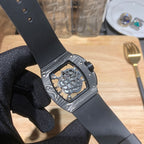 Richard Mille skeleton watch on wrist with dark strap and visible mechanical dial
