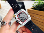 Richard Mille wristwatch back view, white case, black perforated rubber strap
