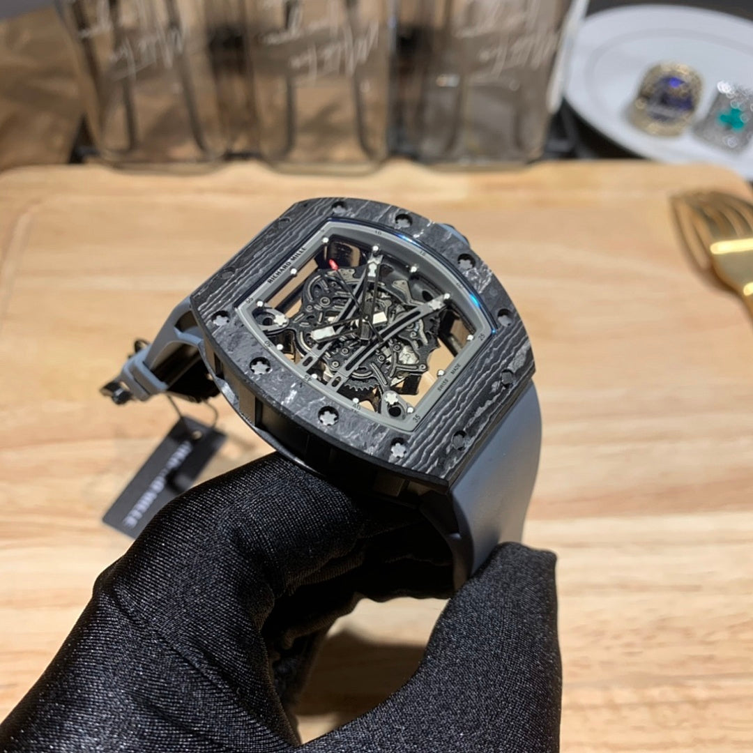 Richard Mille skeleton watch side profile, visible movement through open frame, dark case