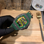Green and dark square skeleton watch with exposed gears and hands, on green strap