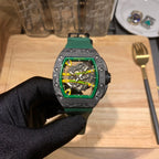 Skeleton wristwatch with square dark case, green dial surround, and green rubber strap