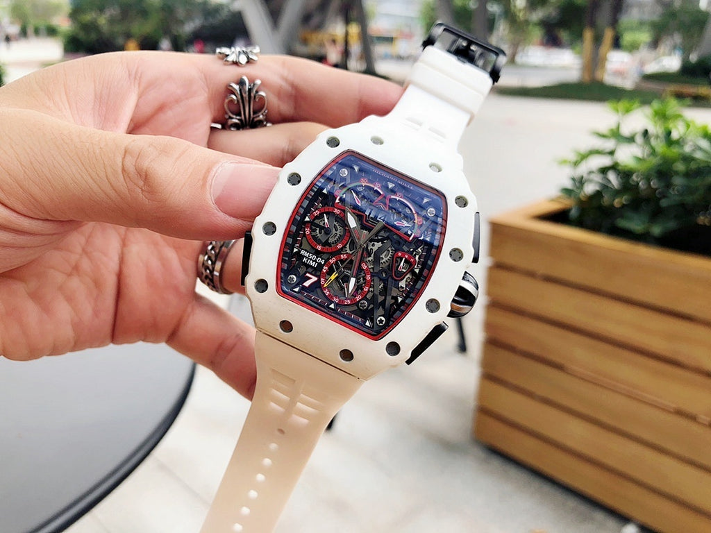 Richard Mille watch close-up, white case and strap with skeleton dial and screws