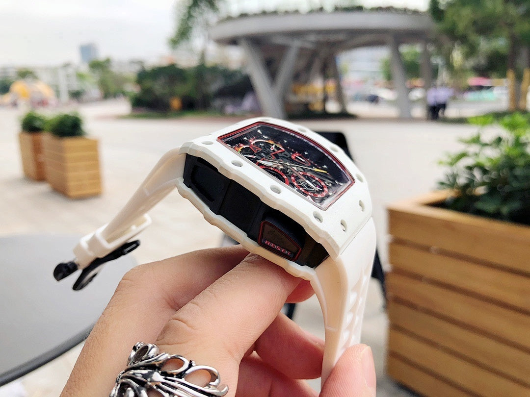 Richard Mille watch back view, white case with dark panel and strap