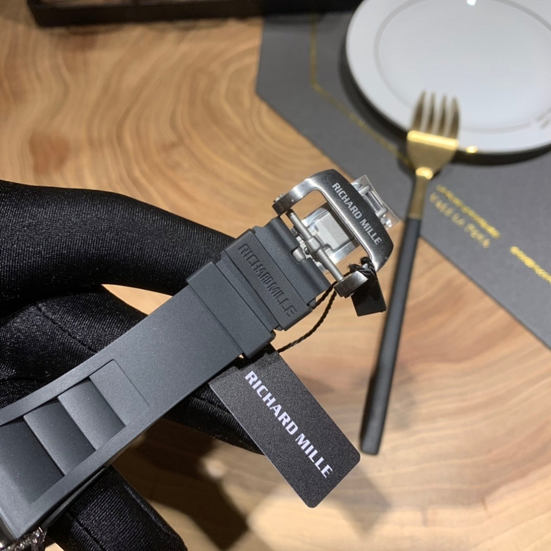 Richard Mille watch clasp and strap with branding, metal hardware visible