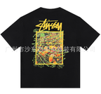 Black T-shirt with colorful square Stussy graphic on back