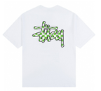 Stussy white T-shirt with green graffiti-style graphic logo on chest