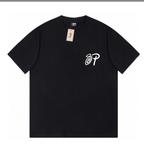 Black T-shirt with small chest logo “SP”