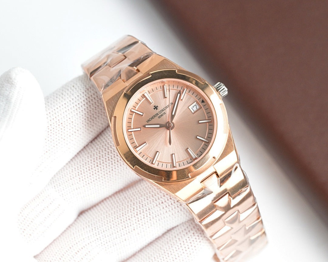Rose gold-tone wristwatch, pink dial, metal bracelet