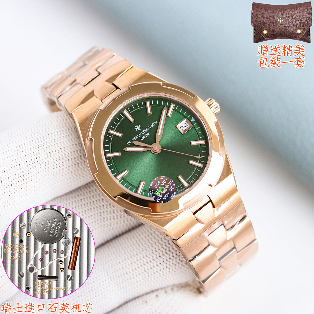 Gold-toned wristwatch with green dial and metal link bracelet, date window at 3