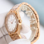 Gold-tone wristwatch with diamond bezel, white dial, and link bracelet detail