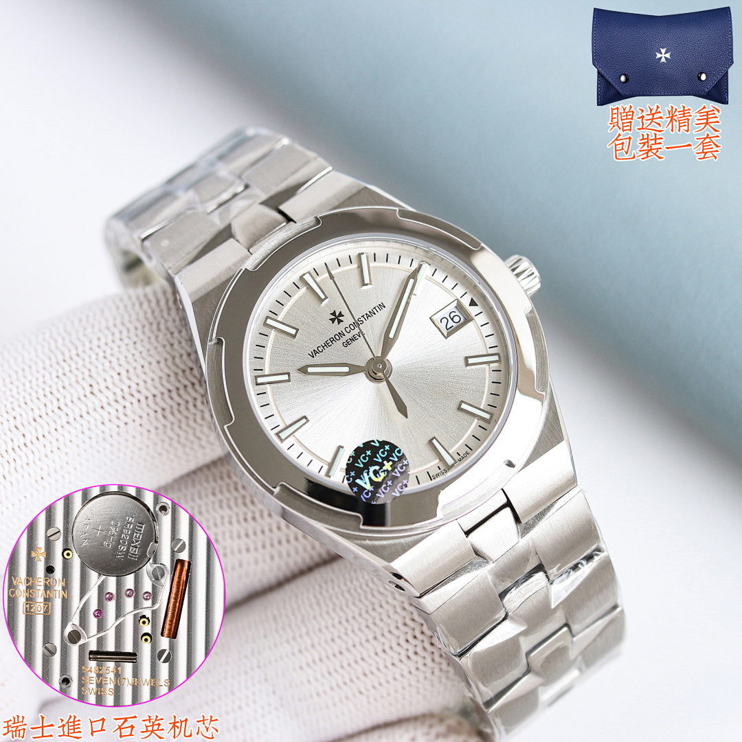 Stainless steel wristwatch with light dial and applied hour markers on a link bracelet.