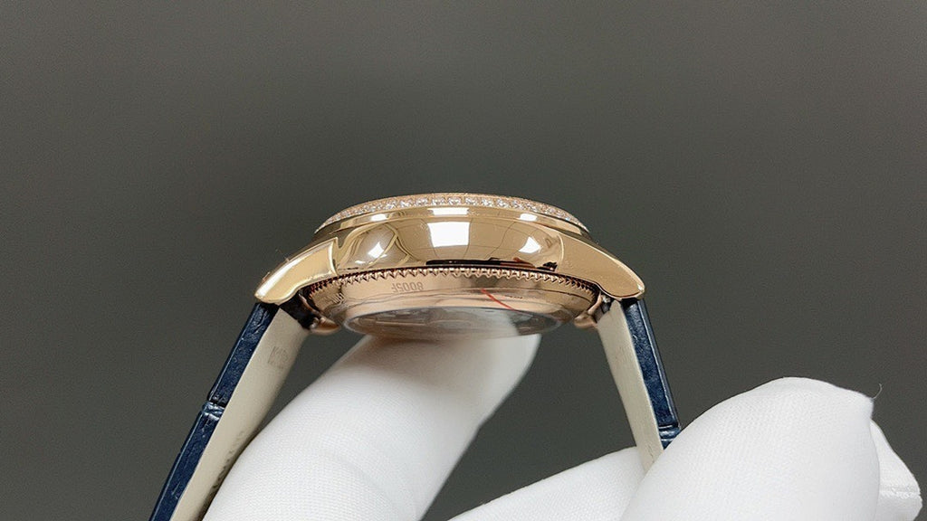 Vacheron Constantin watch top view with rose-gold tone case and blue leather strap