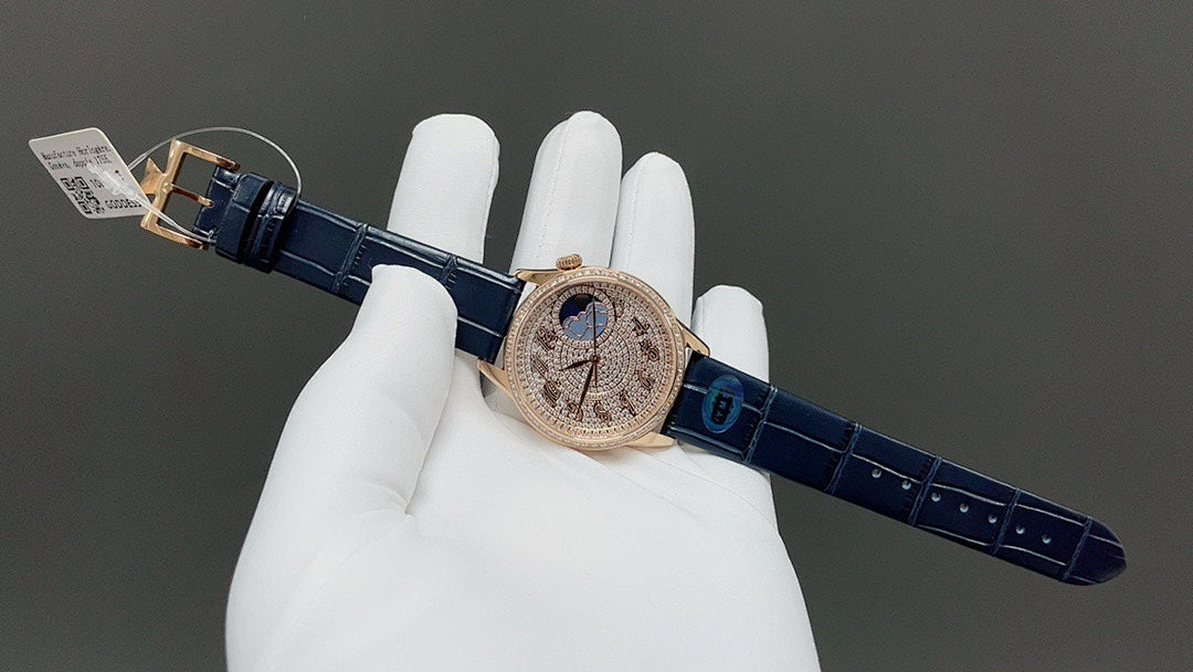 Vacheron Constantin watch angled view with blue leather strap and rose-gold tone case