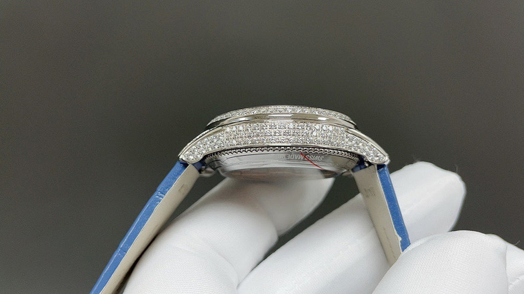 Vacheron Constantin watch case with diamond bezel and blue leather band
