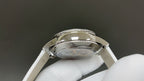 Vacheron Constantin watch case back with polished bezel, white leather strap
