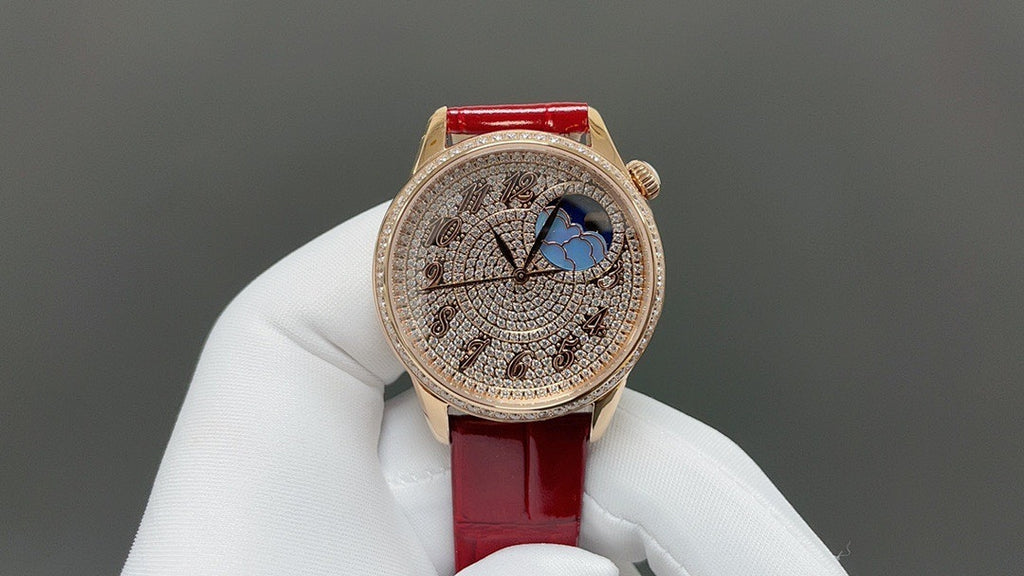 Vacheron Constantin watch front view with blue dial and red leather strap