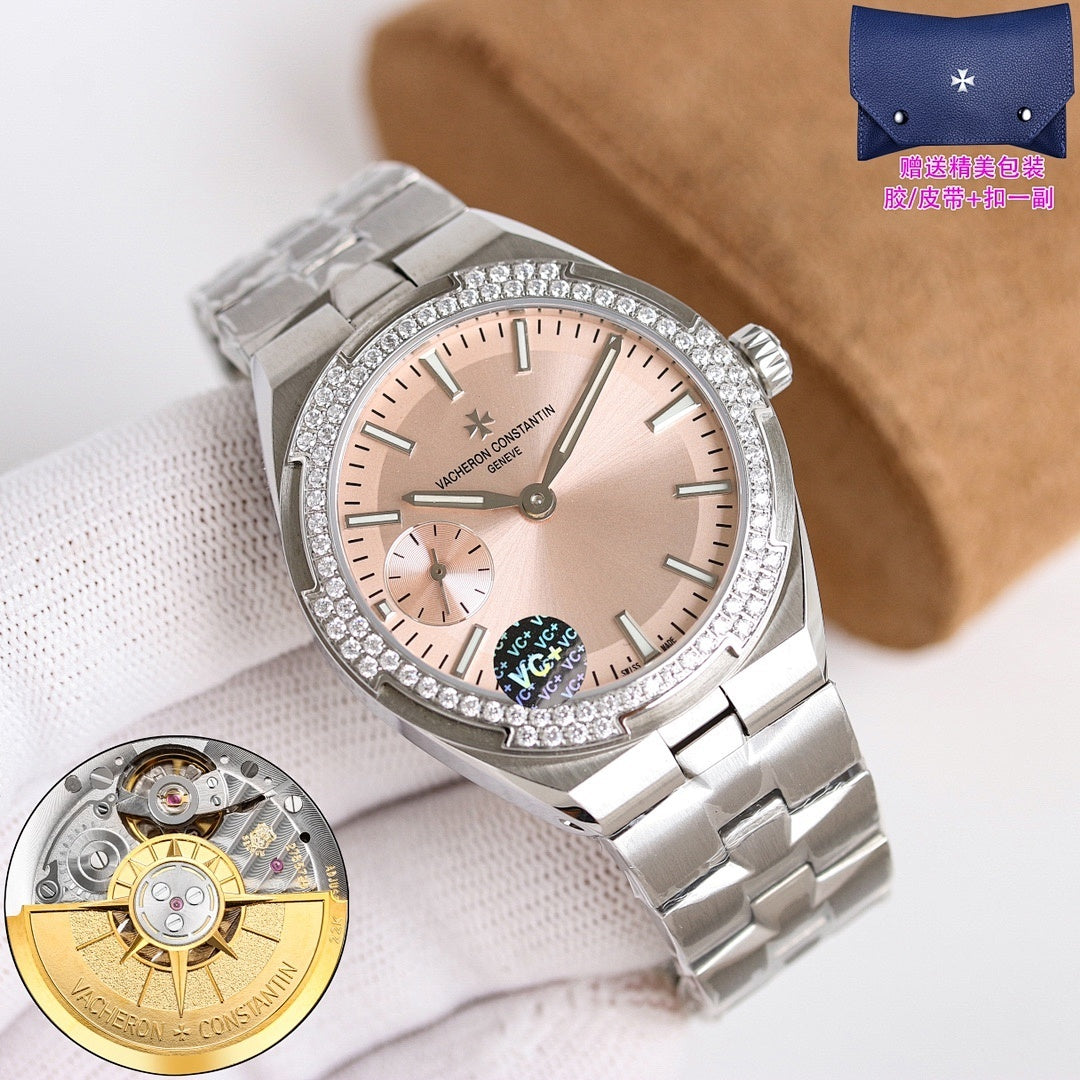 Vacheron Constantin watch with pale pink dial and crystal bezel, metal bracelet