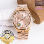 Rose-gold-tone wristwatch with diamond bezel, white dial, and metal link bracelet