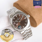 Stainless steel wristwatch angled view with brown dial and steel bracelet