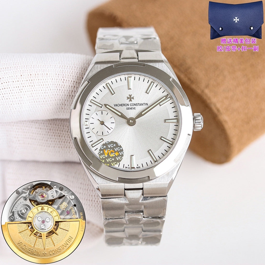 Men's steel wristwatch with white dial, date window, three hands, metal bracelet