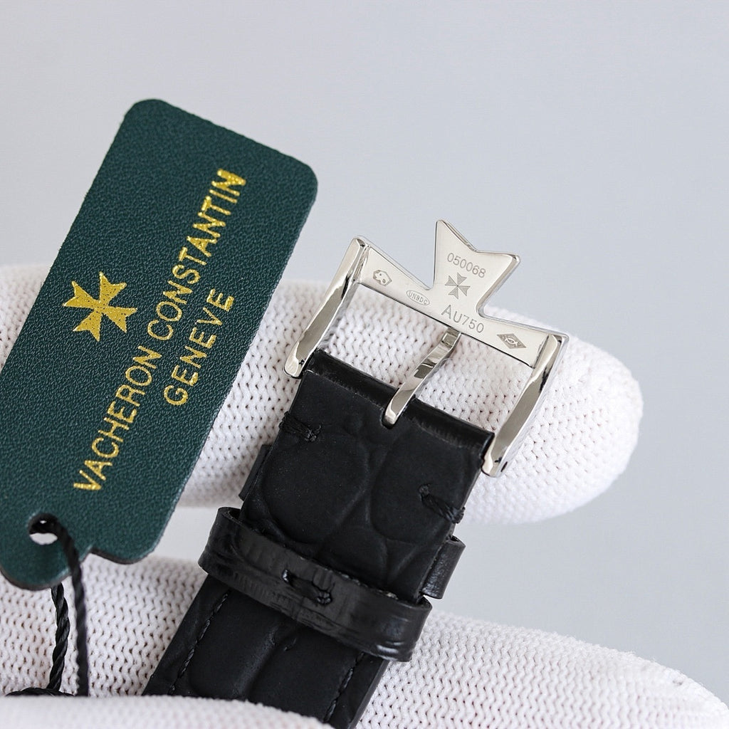 Vacheron Constantin wristwatch with black leather strap and metal buckle, with green box tag