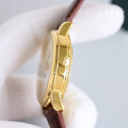 Vacheron Constantin watch with gold case side profile and dark brown leather strap