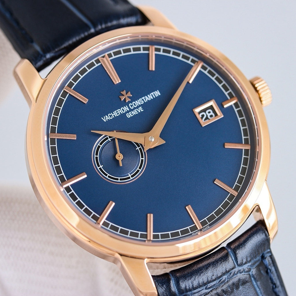 Vacheron Constantin watch with blue dial, gold case, dark blue leather strap, date