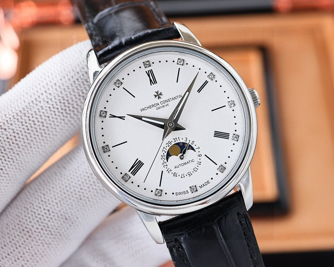 Vacheron Constantin watch with white dial, silver case, black leather strap and Roman numerals