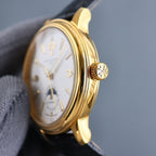 Vacheron Constantin watch case side, gold-tone crown, black leather strap