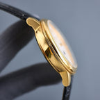 Vacheron Constantin watch case profile, gold-tone, black leather strap